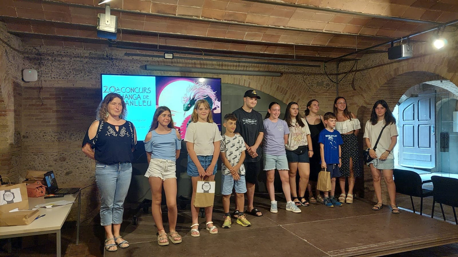 Foto de família amb els guanyadors de l'edició anterior